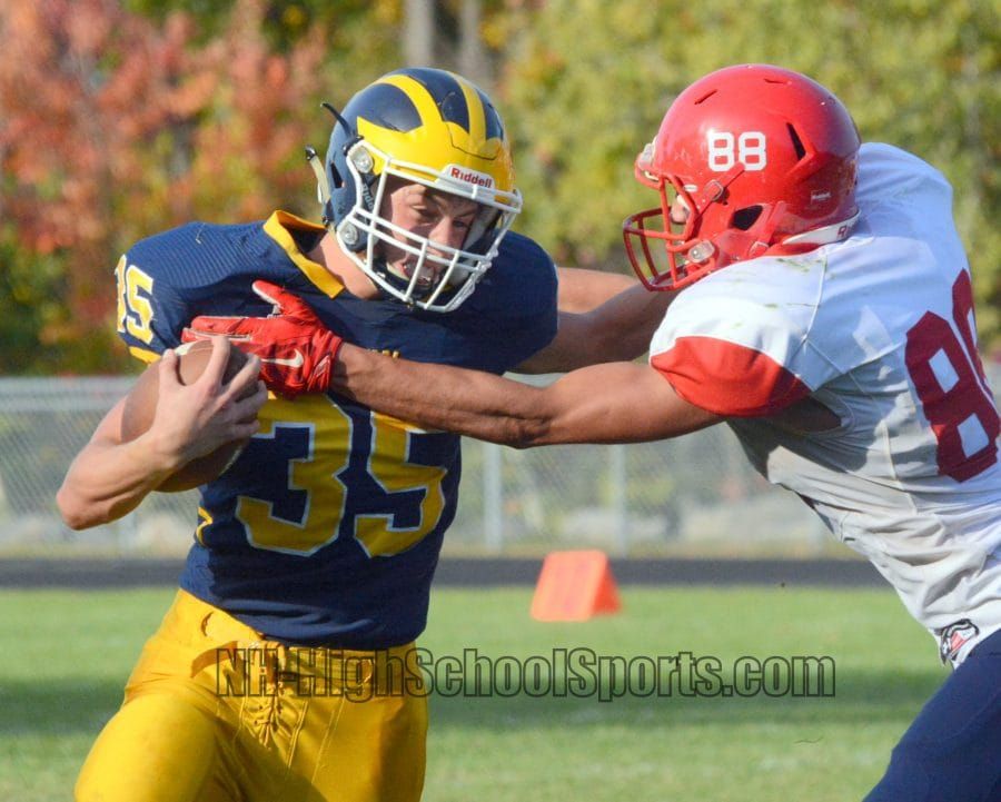 John Stark football holds on for narrow win over Bow