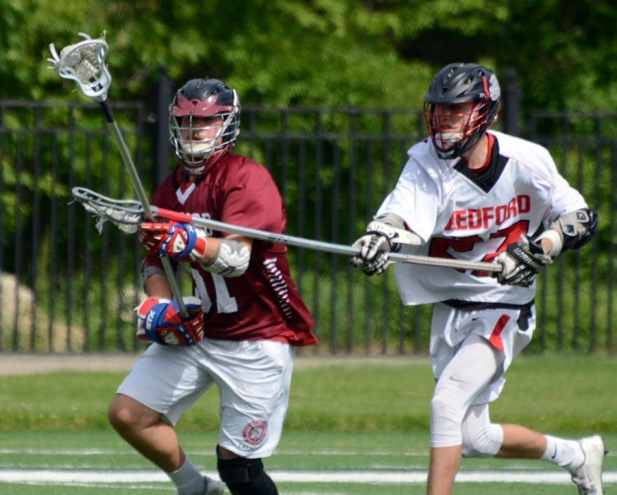 Flynn keeps himself busy on the field for Bedford boys lacrosse