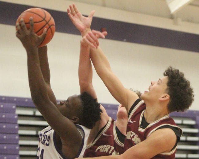 Nashua South boys basketball rallies for win against Portsmouth in D1 playoffs