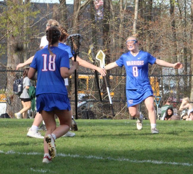 Winnacunnet girls lacrosse starts fast on the way to win against Dover