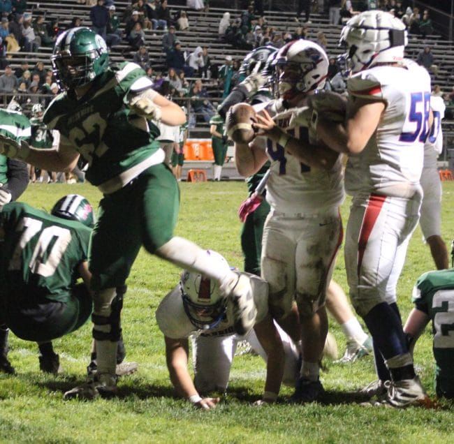 Winnacunnet football beats Dover to wrap up playoff spot