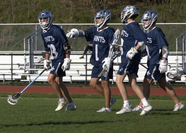 St. Thomas boys lacrosse comes all the way back to beat Winnacunnet
