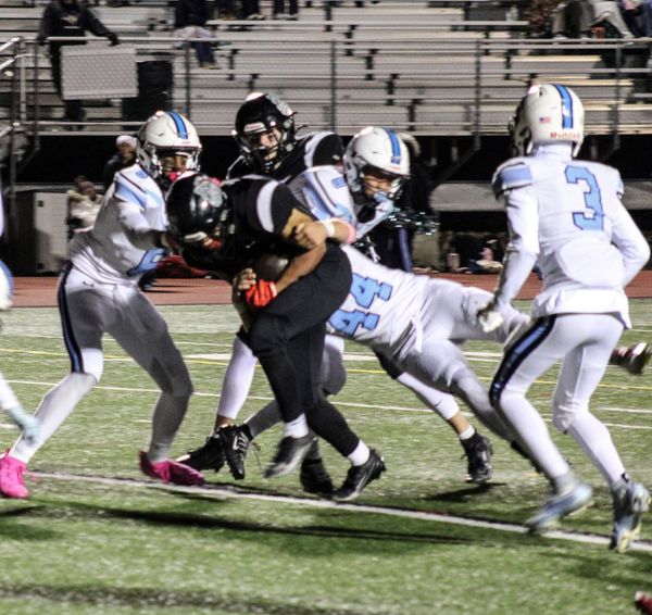 Bedford football runs past Nashua North to get key win
