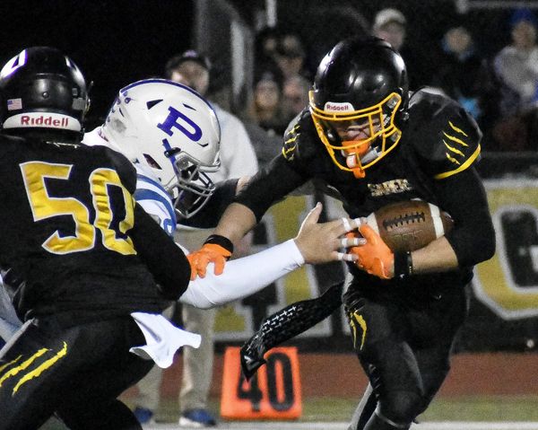 Names, faces change, but Souhegan football keeps on rolling