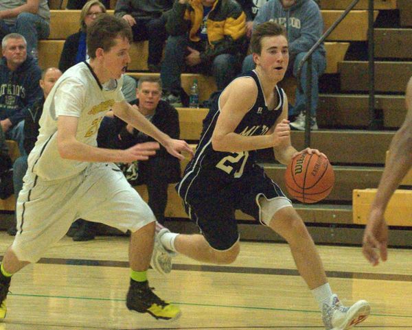 Milford boys basketball holds off Souhegan surge to pick up win