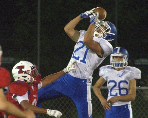 Passing attack lifts Hollis Brookline football over Trinity