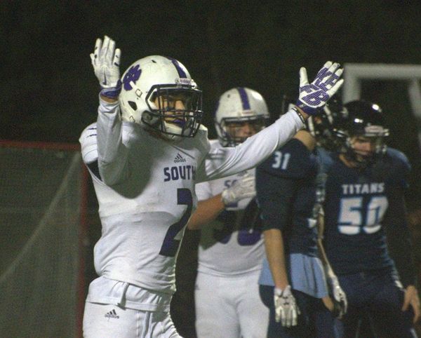 Nashua South football hangs on to beat Nashua North in Turkey Bowl