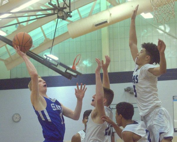 Salem boys basketball holds off Nashua North to pick up win