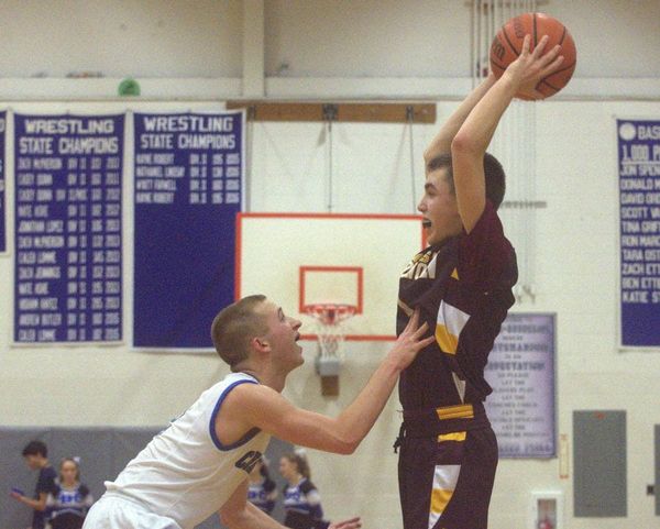 Change in defensive game plan worked well for Hollis Brookline boys basketball