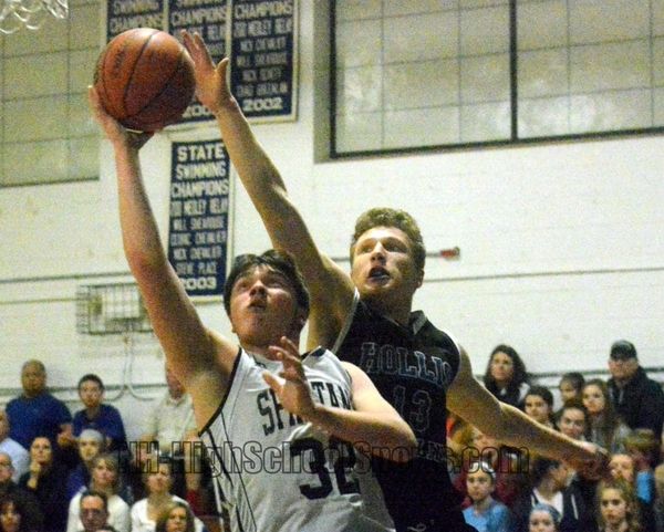 Milford boys basketball closes regular season with win over Hollis Brookline