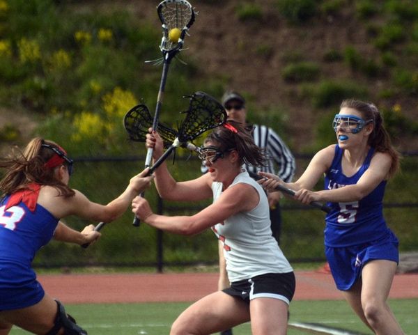 Bedford girls lacrosse focused on staying together, getting ready for postseason