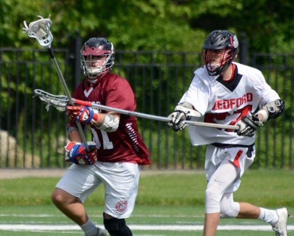 Flynn keeps himself busy on the field for Bedford boys lacrosse