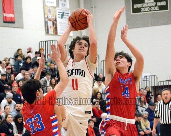 Boys Basketball Roundup: Bedford comes back to knock off Trinity in overtime