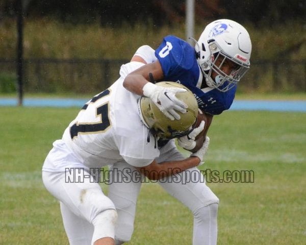 Salem football gains experience, along with a win