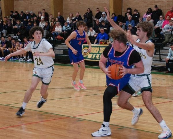 Londonderry boys basketball squeaks by Bishop Guertin for 1st win