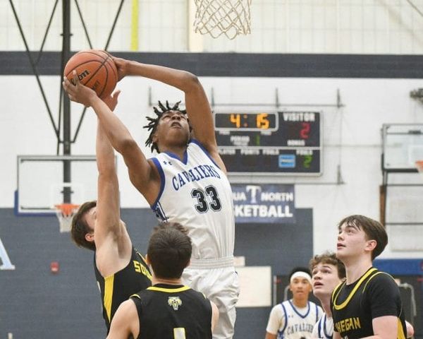 Late surge helps Hollis Brookline boys basketball pull away for D2 playoff win over Souhegan (video)