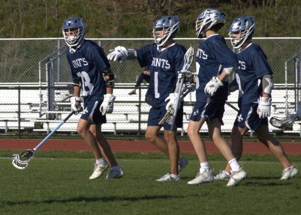 St. Thomas boys lacrosse comes all the way back to beat Winnacunnet