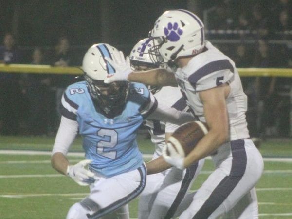 Nashua South football able to hold off Nashua North