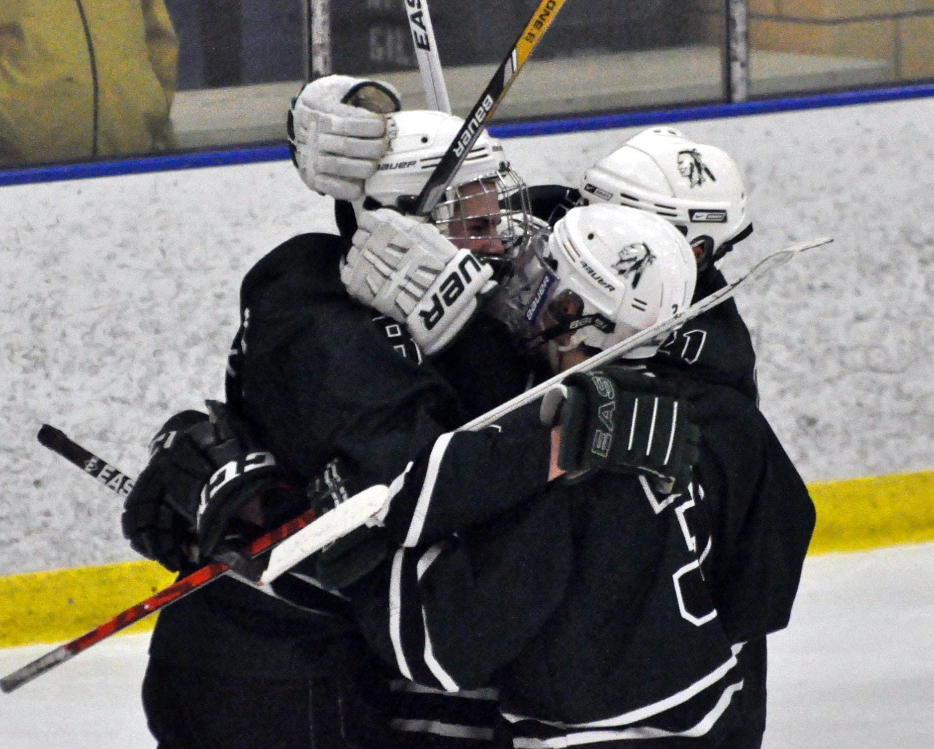 Manchester Central players celebrate Wednesday after Devon Sprague's game-winning goal. For more photos, go to the Photo Album.