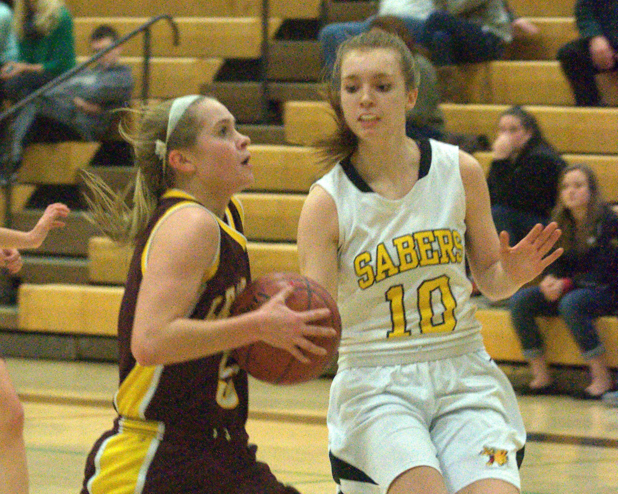 Lebanon's Emily Kehoe drives to the basket against Souhegan's Hannah Kenney during Tuesday's game. For more photos, go to the Photo Album.