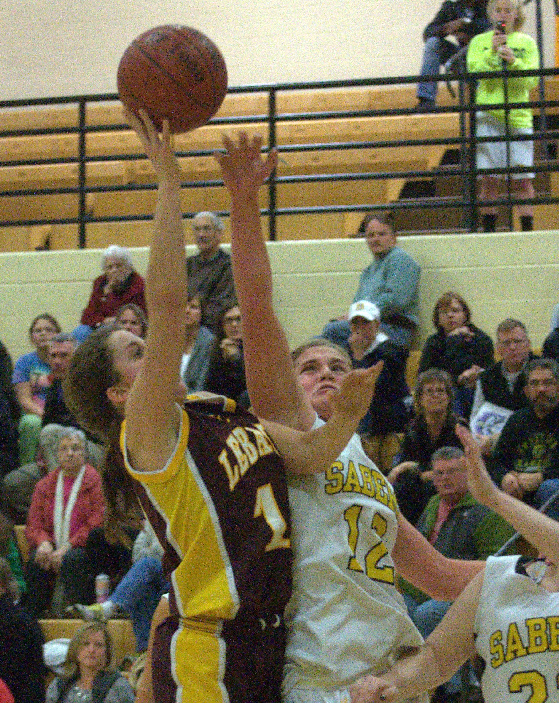 Souhegan's Hannah Chick tries to block a shot by Lebanon's Samantha MacDonald.