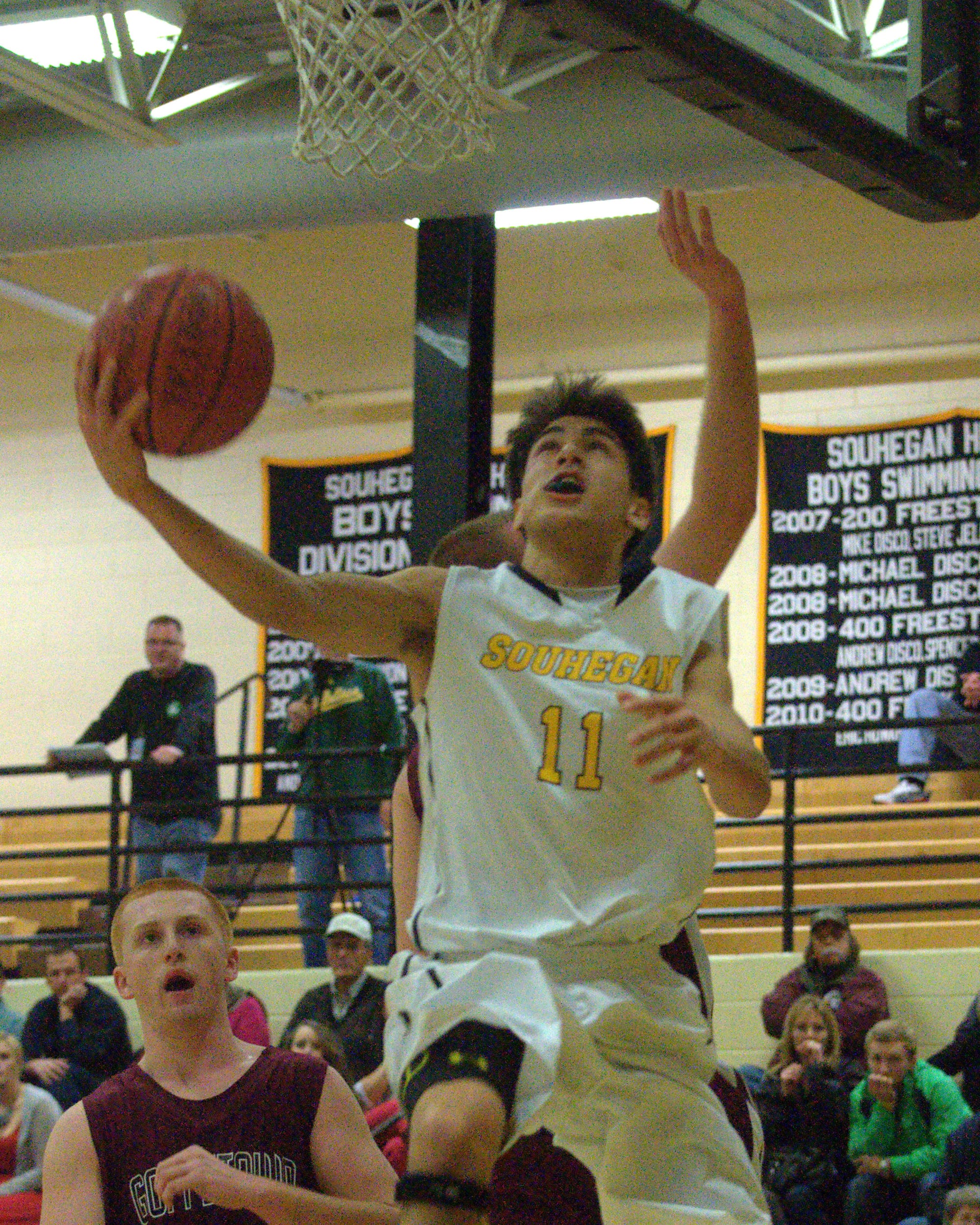 Souhegan's Brandon Len goes in for a layup during Friday's game against Goffstown. For more photos, go to the Photo Album.