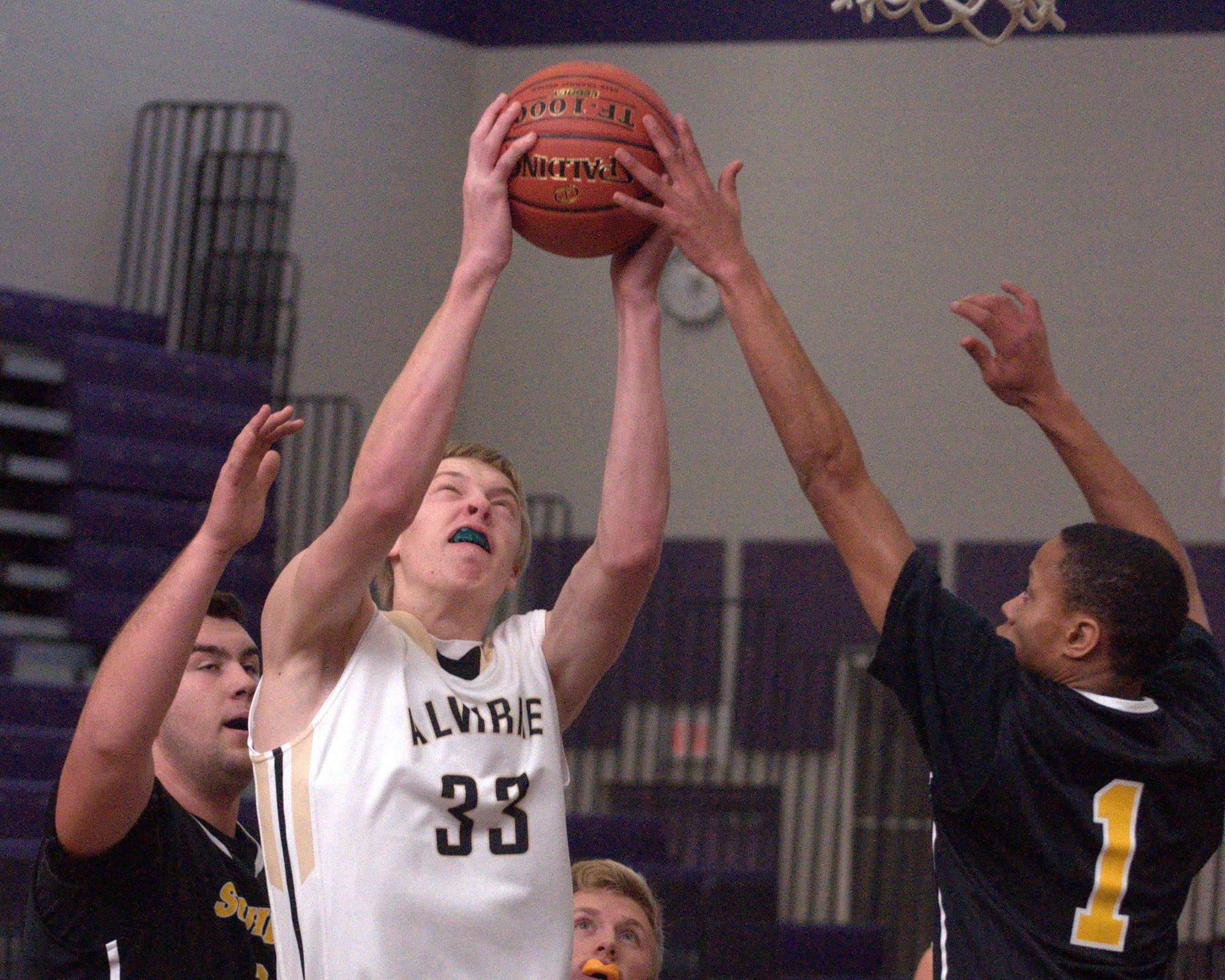 Alvirne's Tyler Livingston drives to the basket against Souhegan's AJ Hayes during Friday's game.