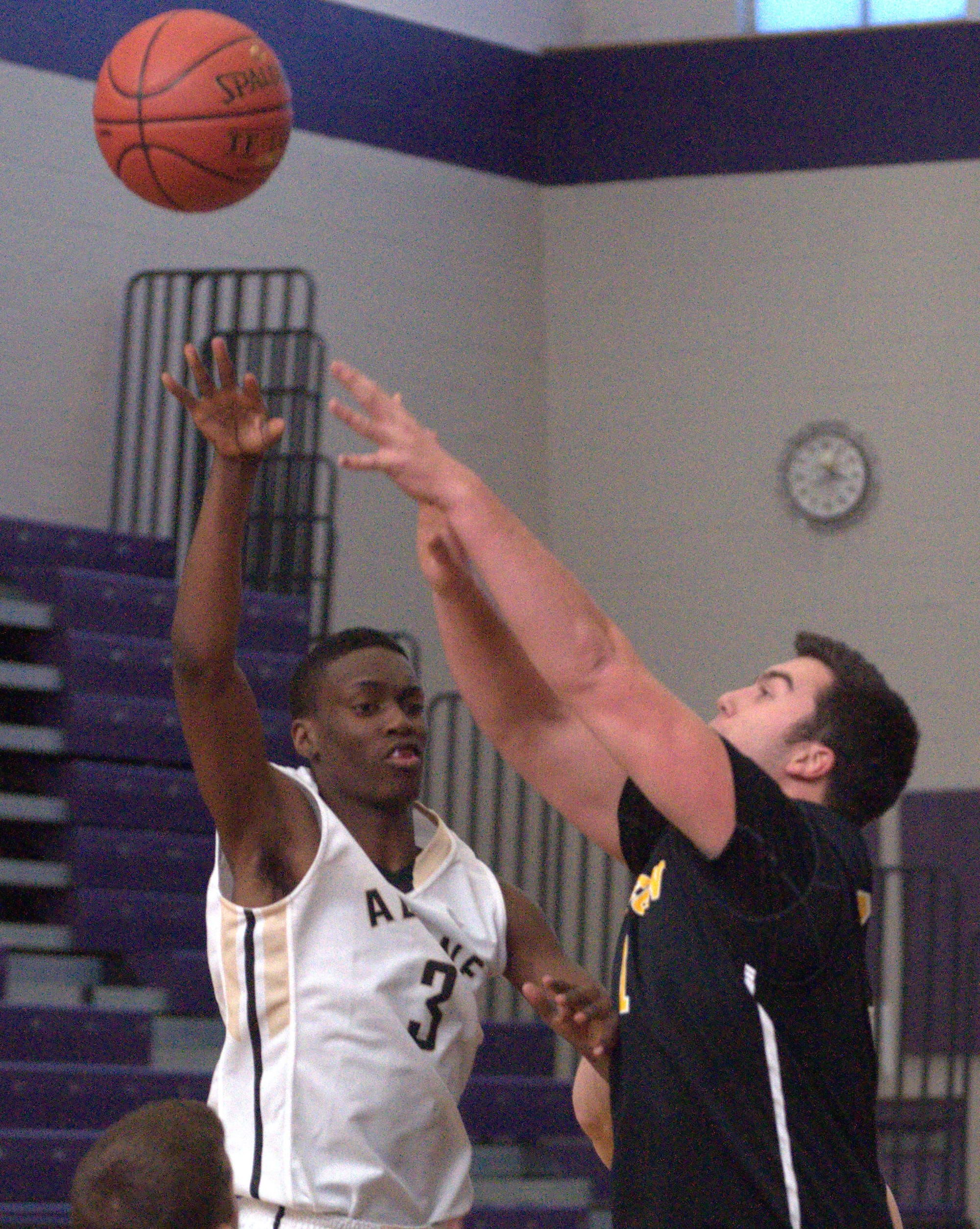 Souhegan's Jake Kennedy tries to get a hand on a pass by Alvirne's Kevin Pierre.