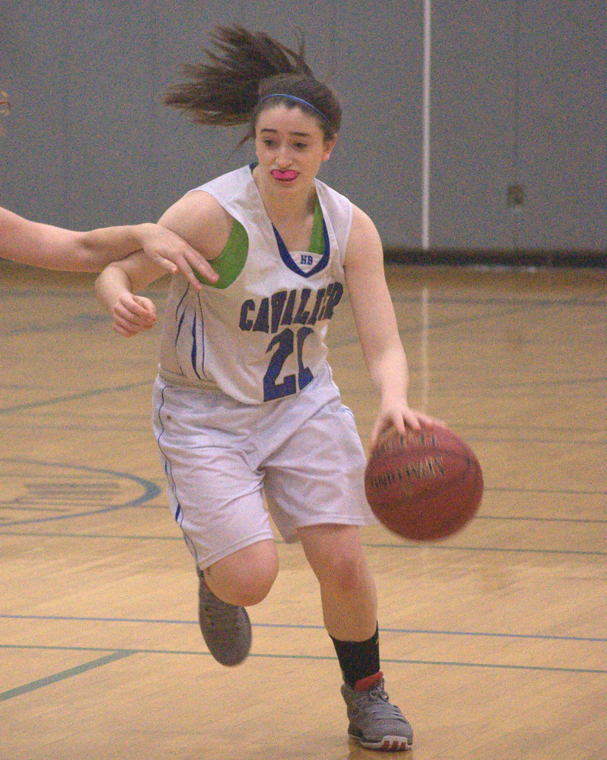 Hollis Brookline's Ellie Flaum drives to the basket.