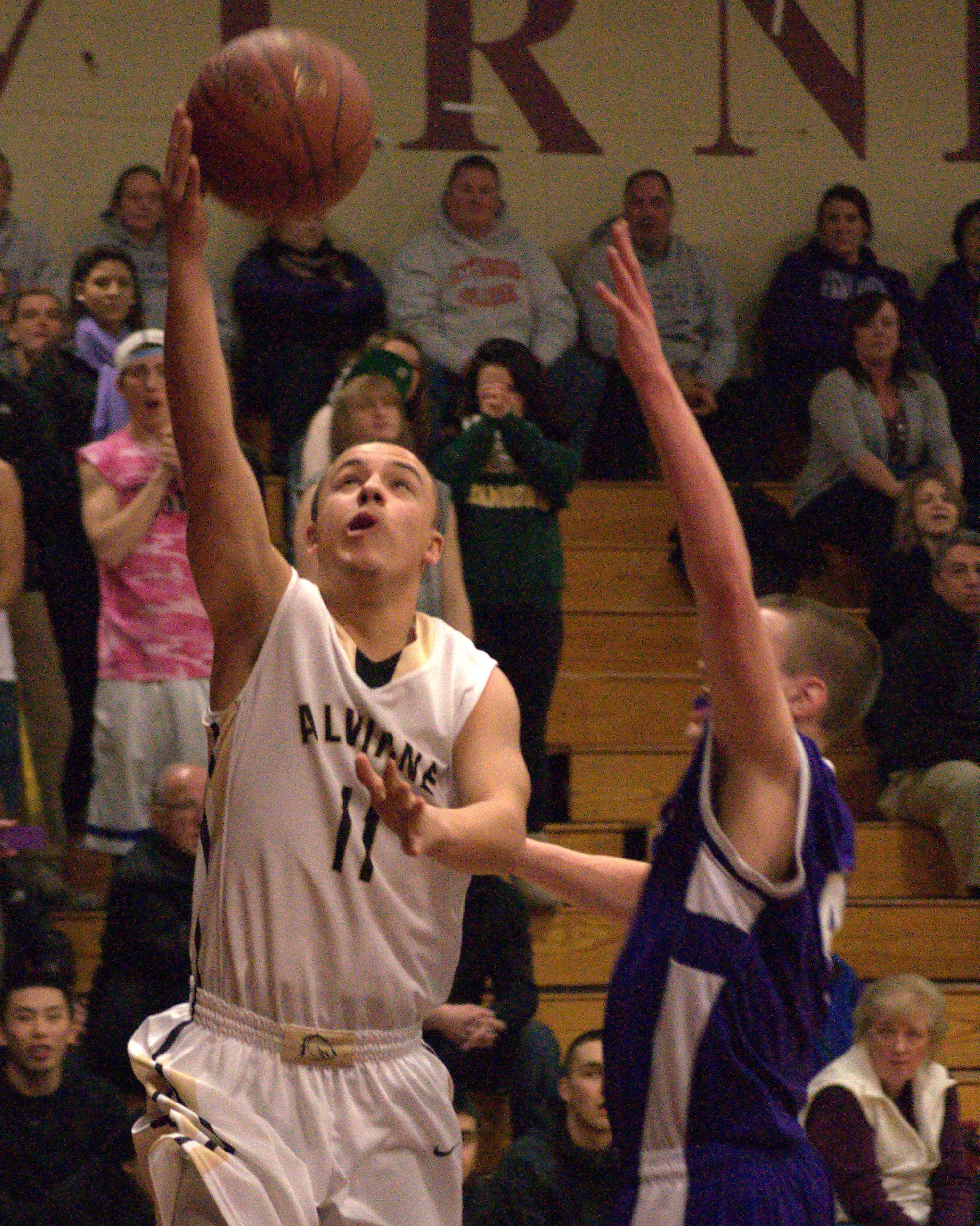 Alvirne's Richie Eaton goes in for a layup.