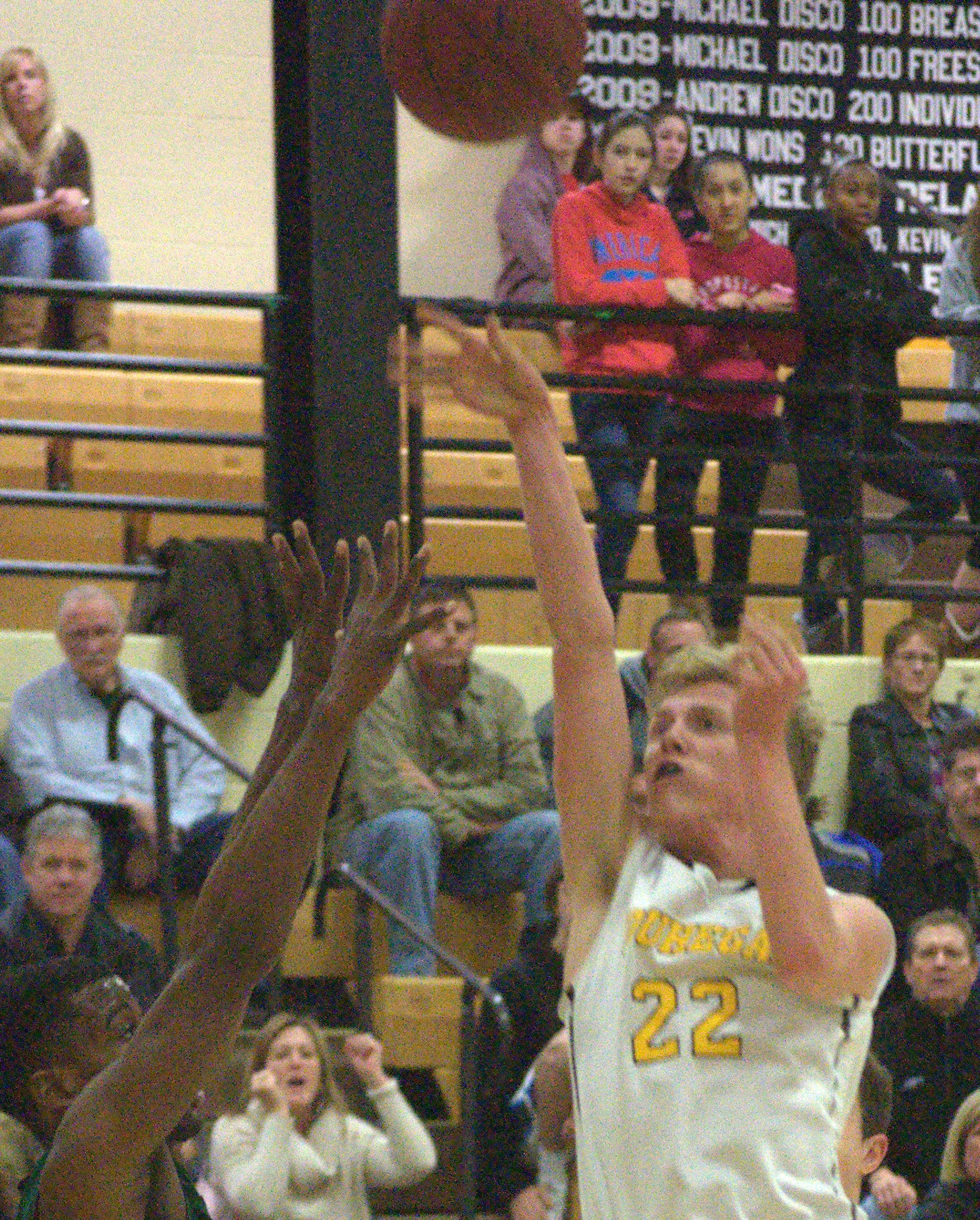 Souhegan's Tanner Kent shoots over Pembroke's Kafani Williams.