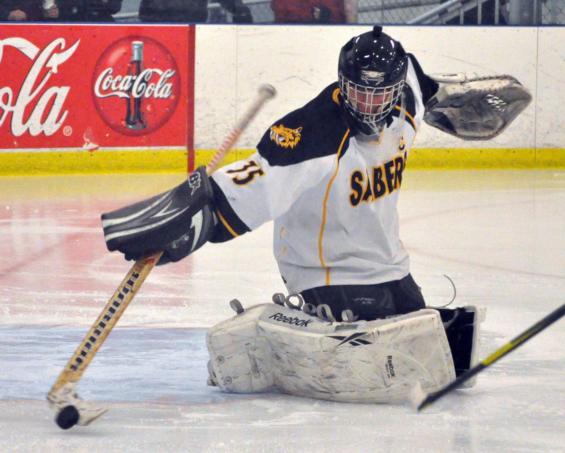 Souhegan goalie Ryan Peterson makes a save.