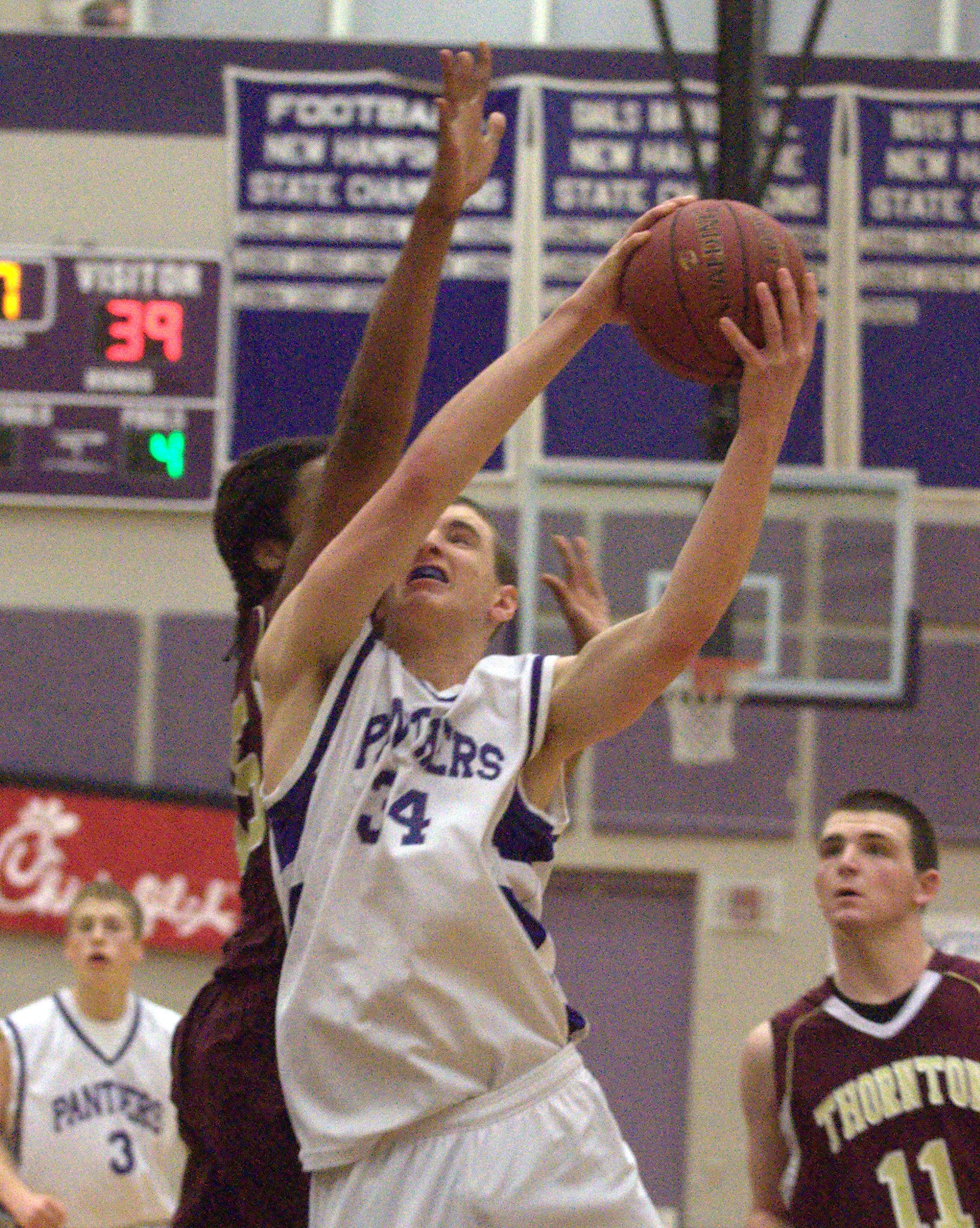 Nashua South's Jack Preston drives to the basket during Saturday's title game.