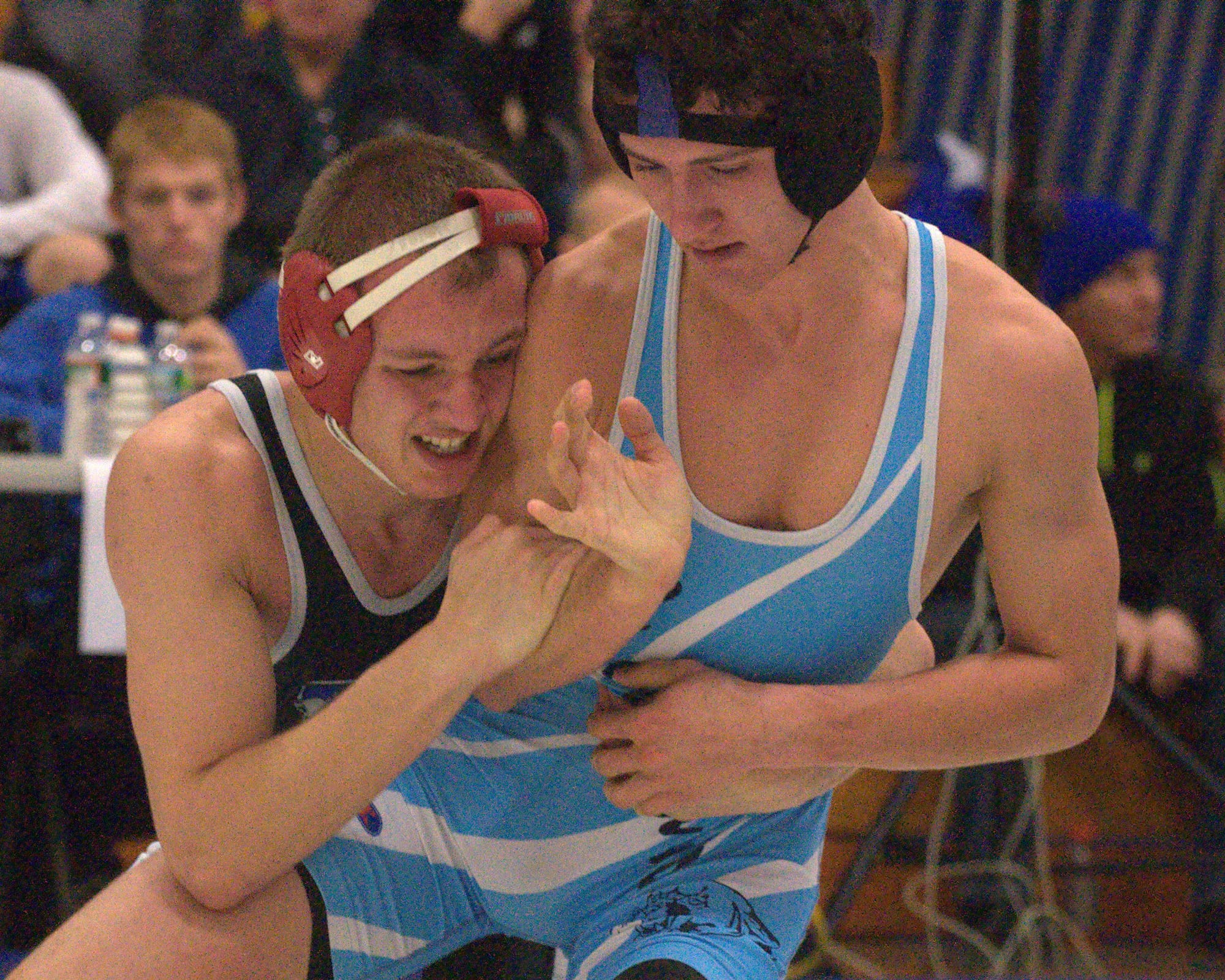 Merrimack's Kyle Mercer wrestles against Brendon Giroux of Mt. Mansfield Union in the 145-pound quarterfinals Saturday at the Merrimack Hall Of Fame Invitational. For more photos, go to the Photo Album.