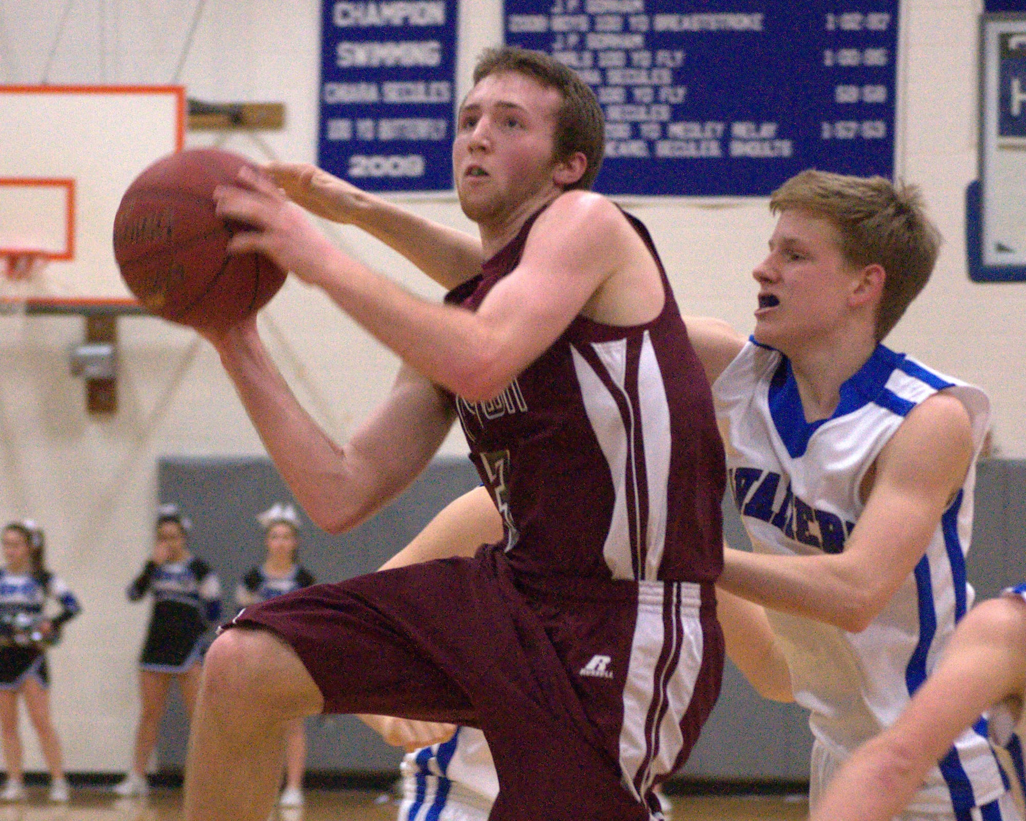 Goffstown's Jake Mount drives to the basket during last Thursday's game against Hollis Brookline.