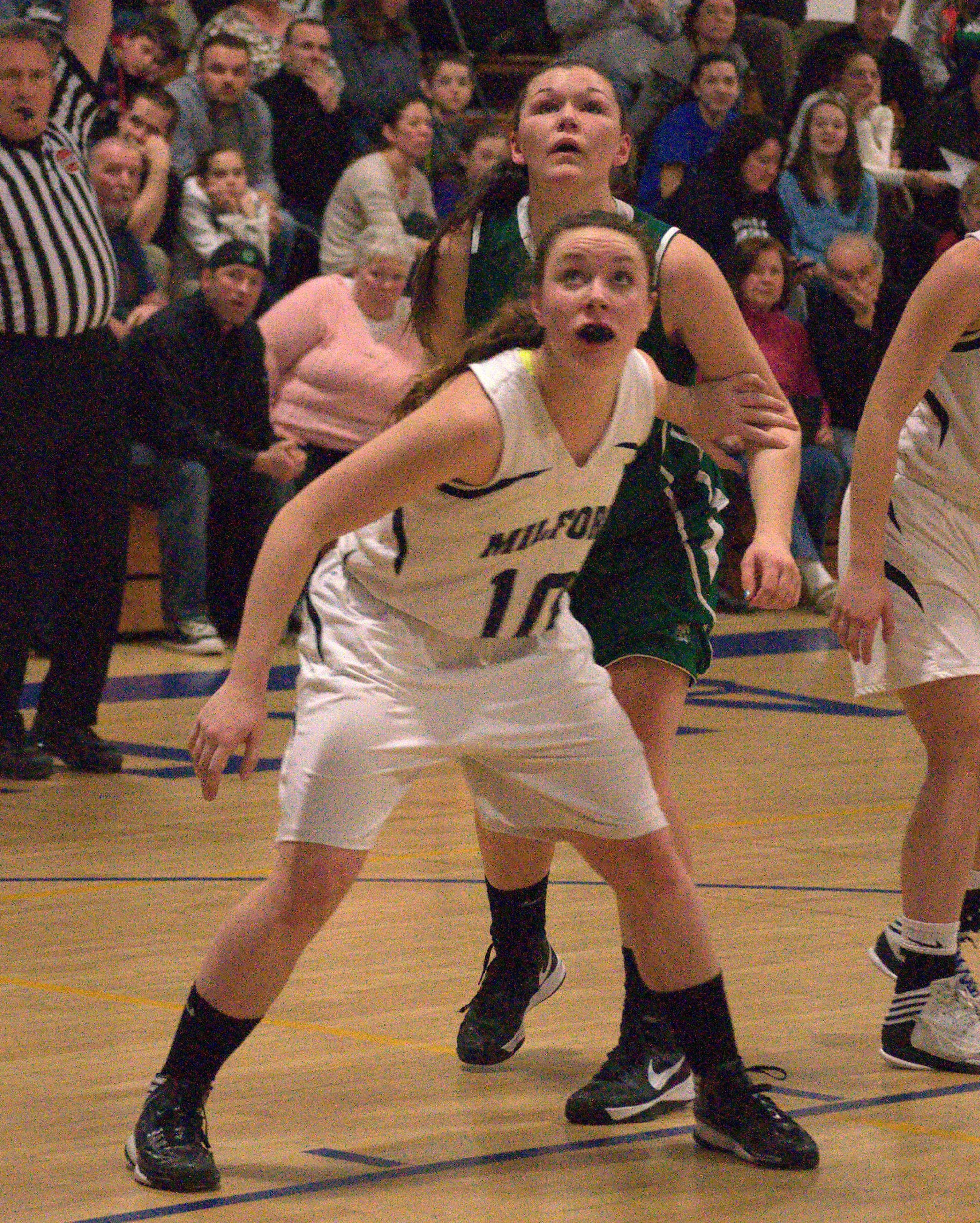 Milford's Dina Pitsas waits for a rebound during Tuesday's playoff game.