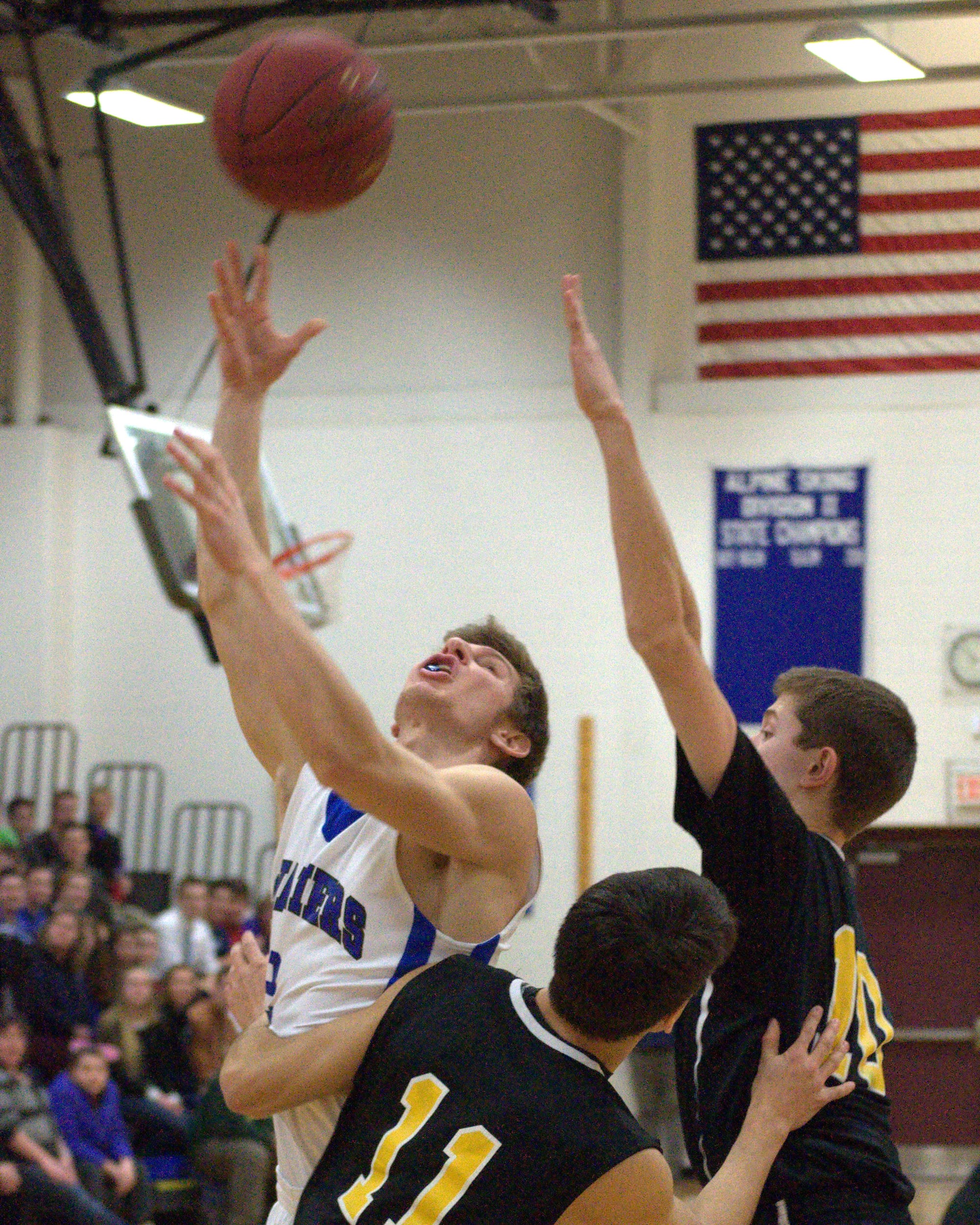 Hollis Brookline's Connor Walsh puts up a layup during Tuesday's game. For more photos, go to the Photo Album.