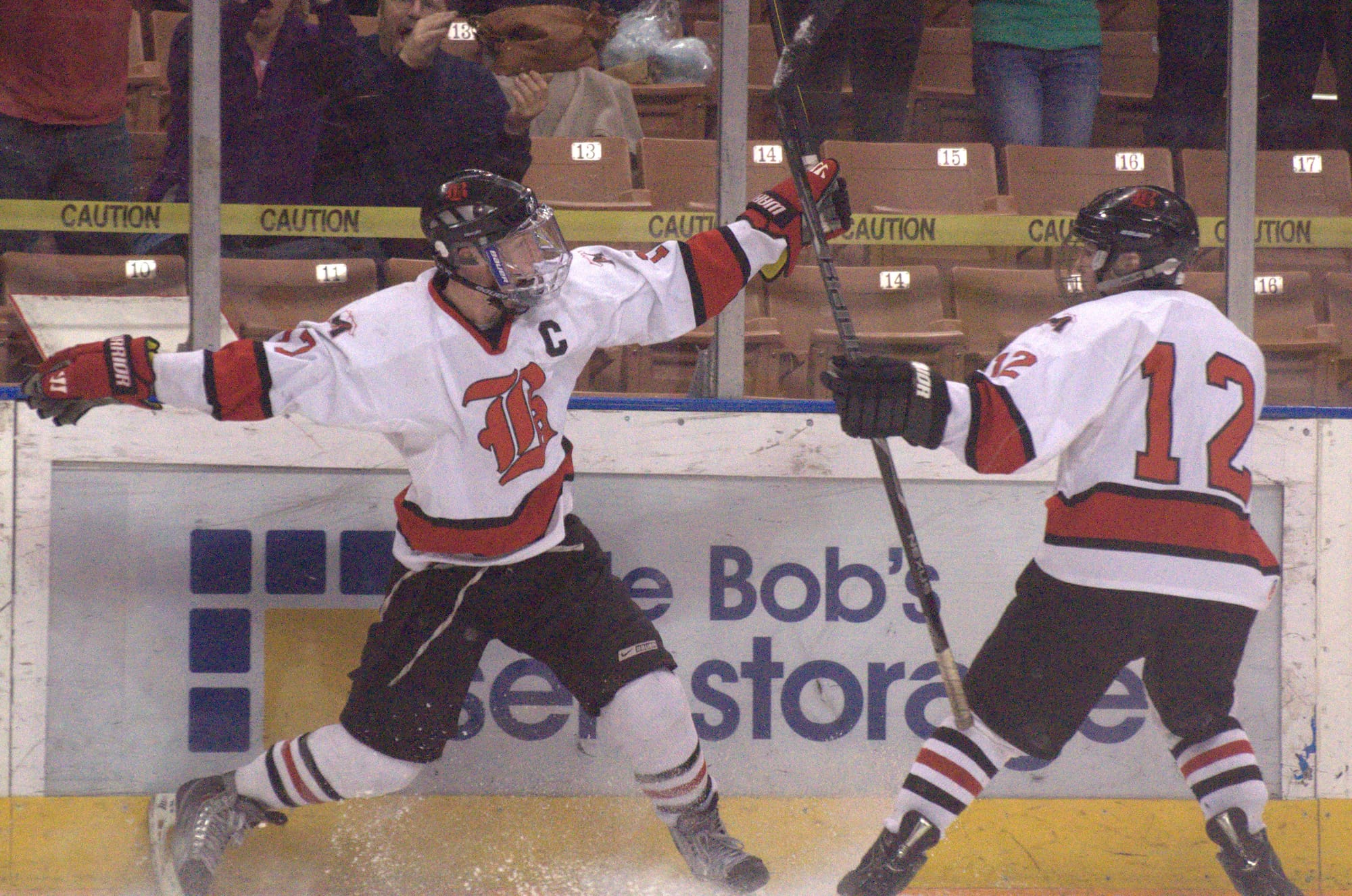 Berlin's Connor Jewett, left, and Mike Lemoine celebrate after Jewett scored.