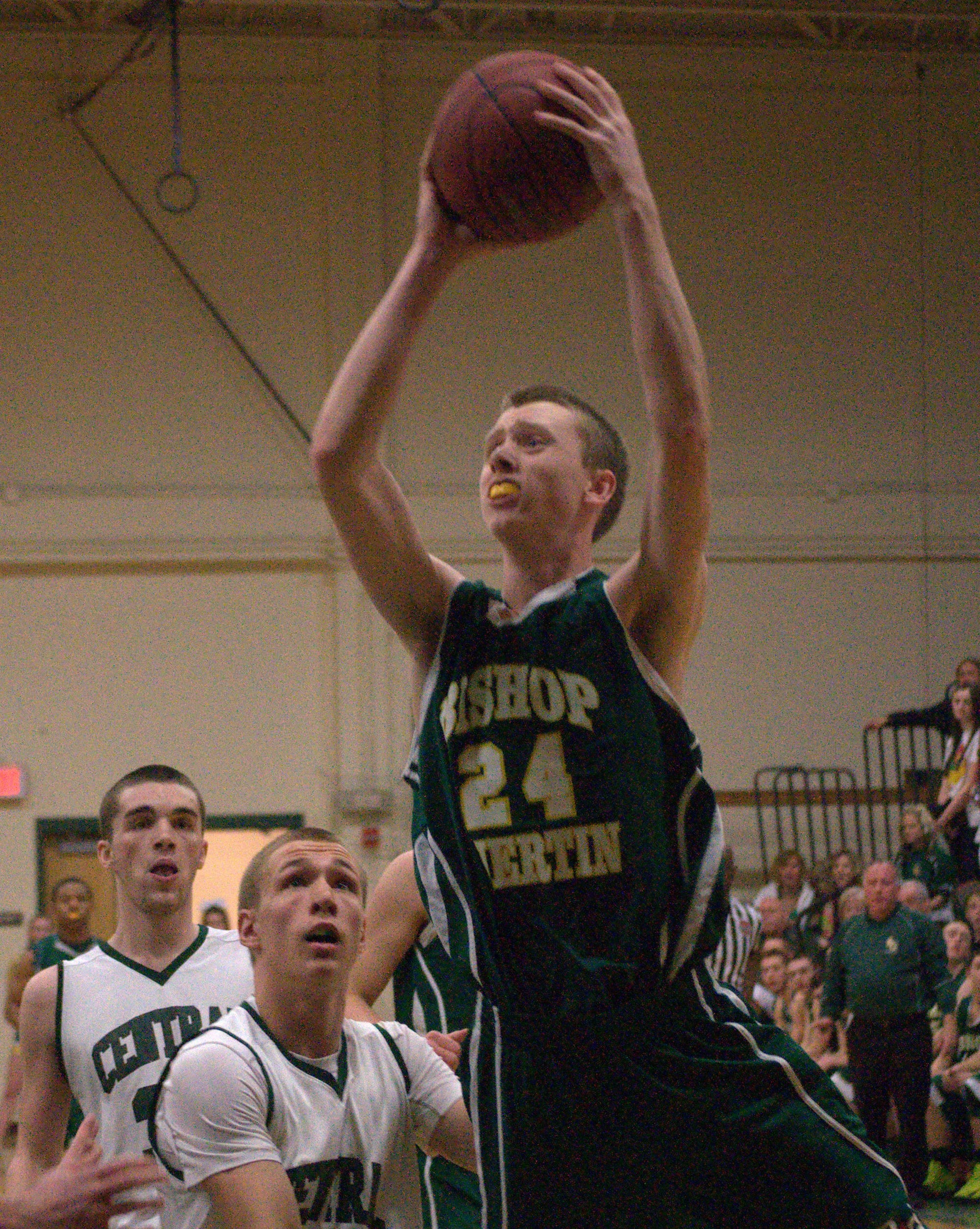 Bishop Guertin's Andrew Williams goes in for a layup during Friday's game.