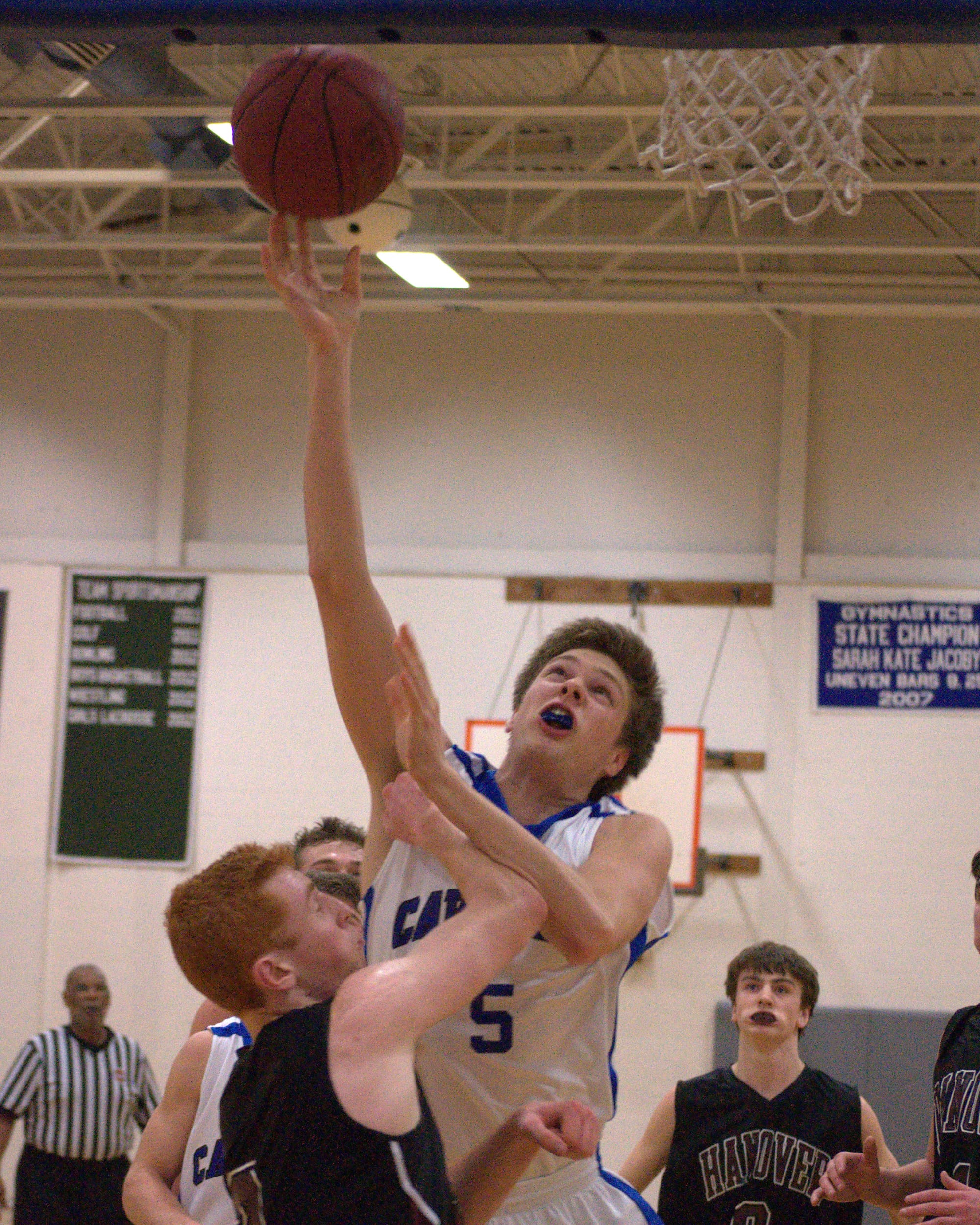 Hollis Brookline's Shea Whalen puts up a shot during Thursday's game. For more photos, go to the Photo Album.