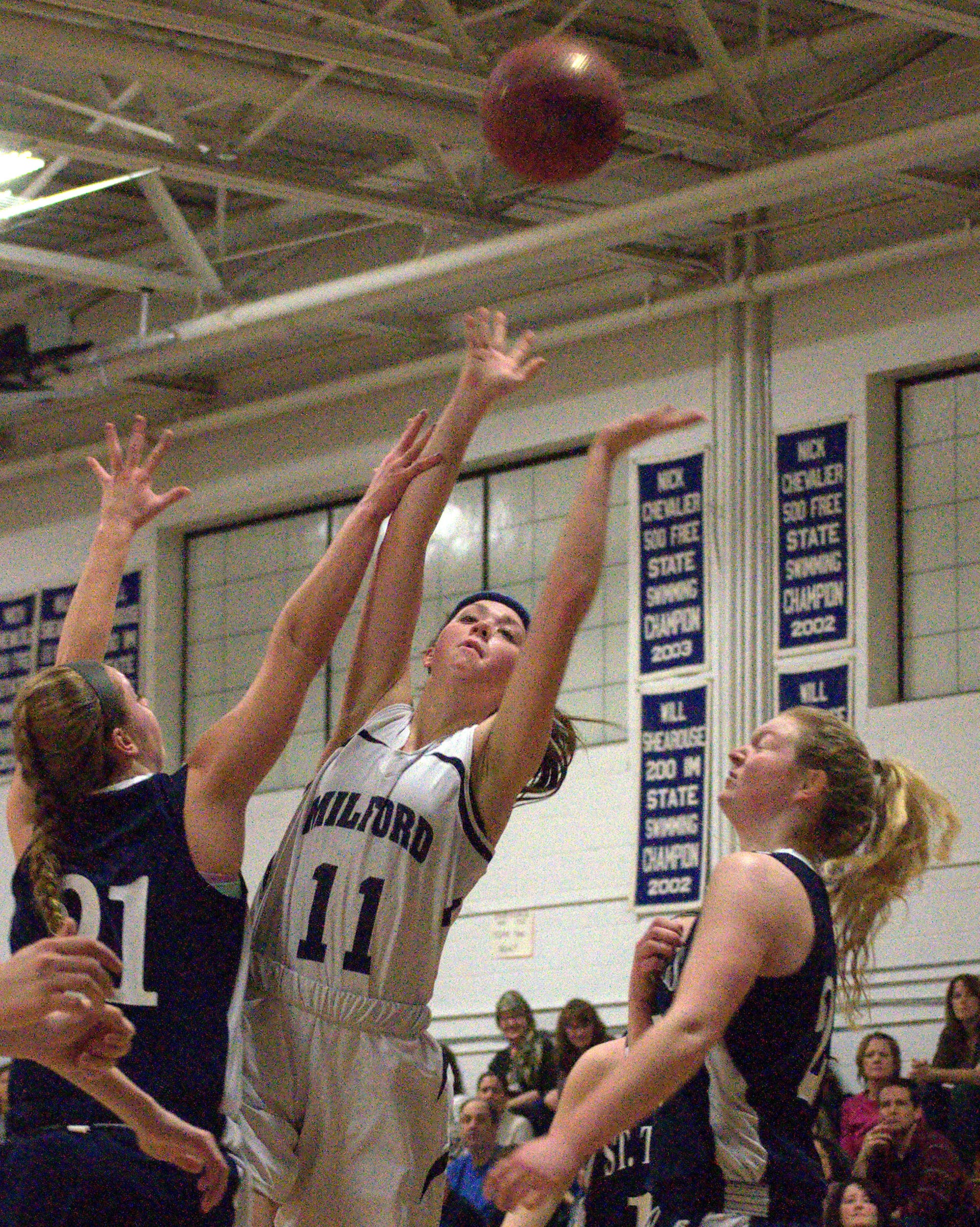 Milford's Kaitlyn Matthews puts up a shot during Friday's game. For more photos, go to the Photo Album.