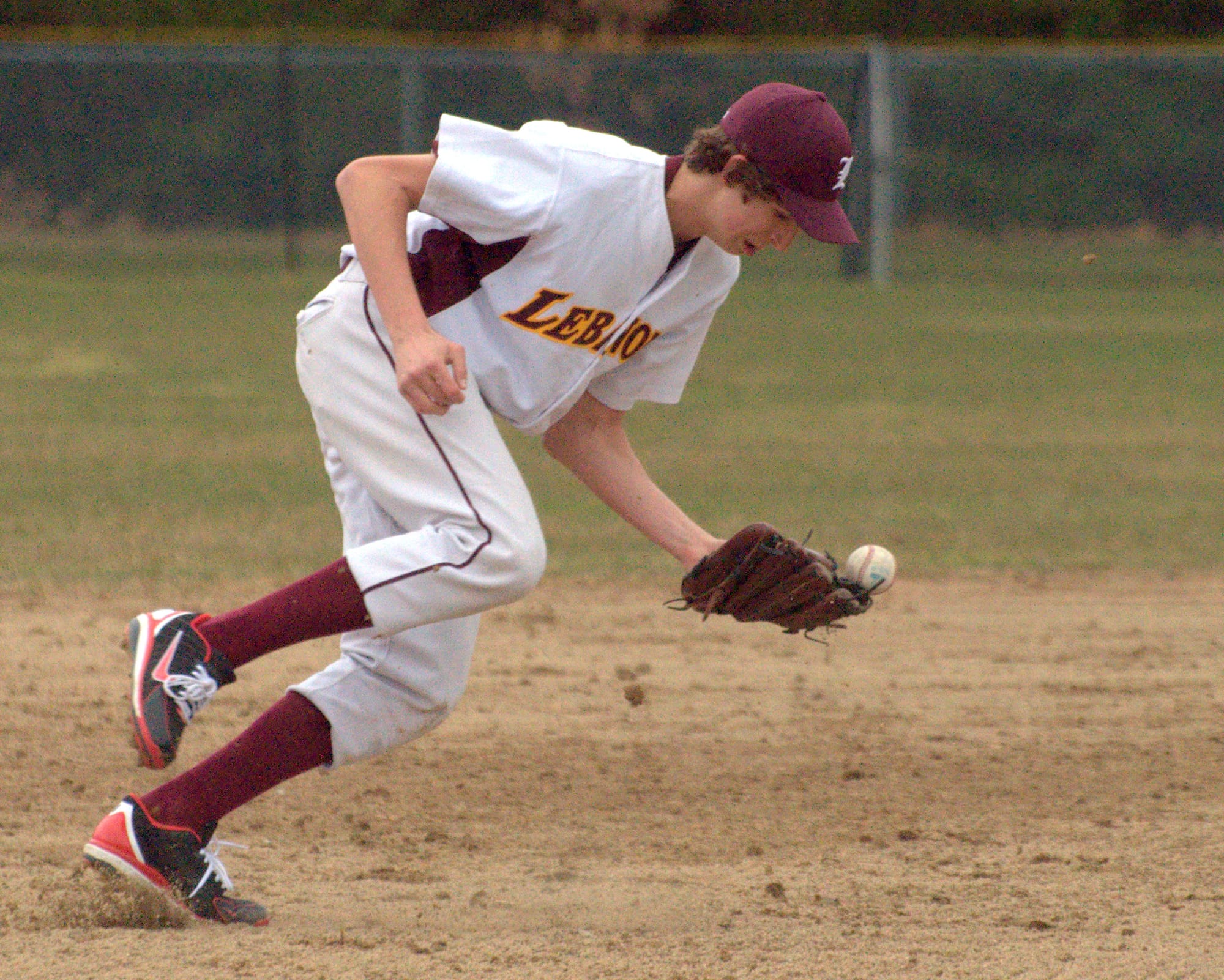 Lebanon's Cam Broughton stops a ground ball.