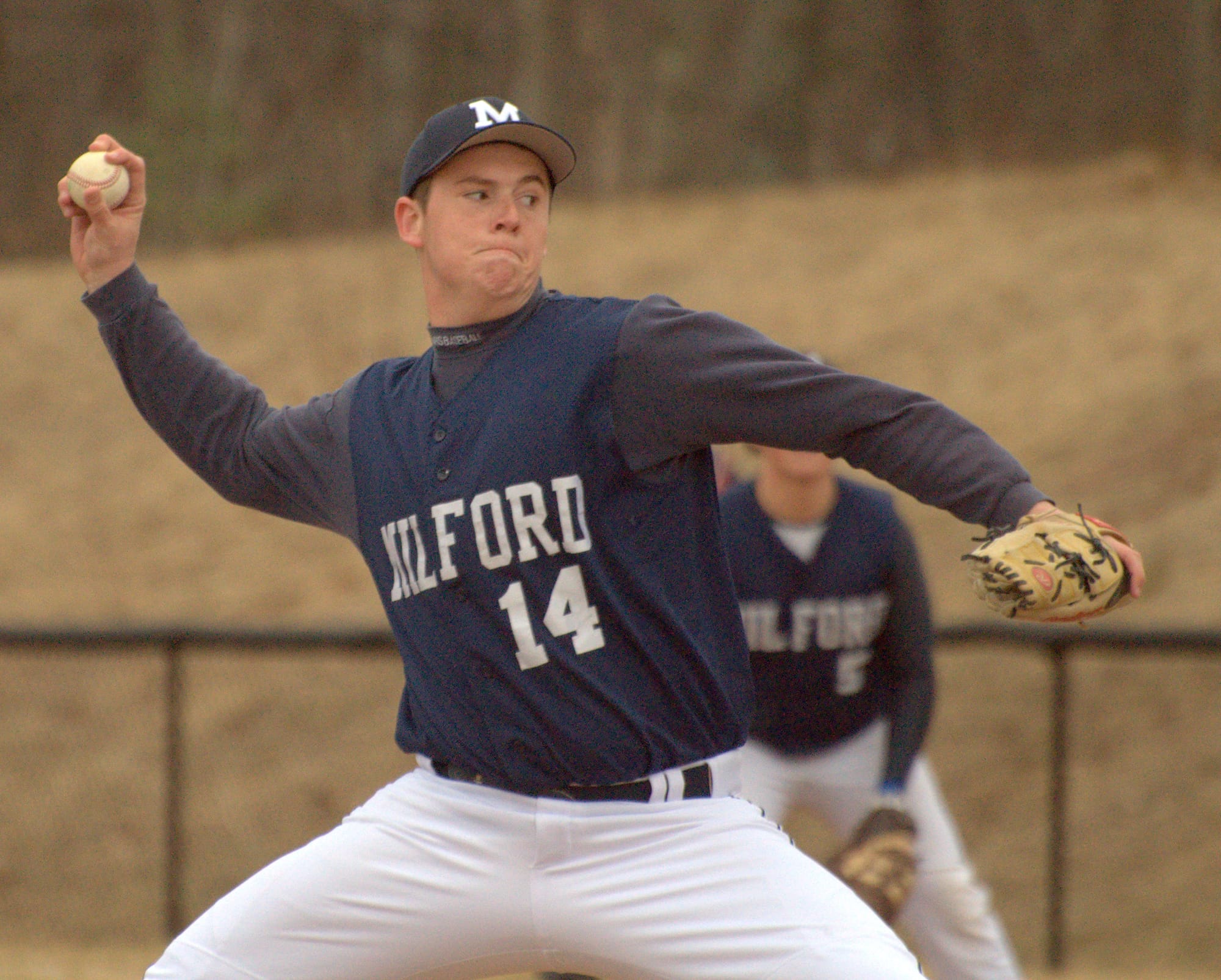 Milford's Logan Danforth delivers a pitch during last Thursday's game against Windham.