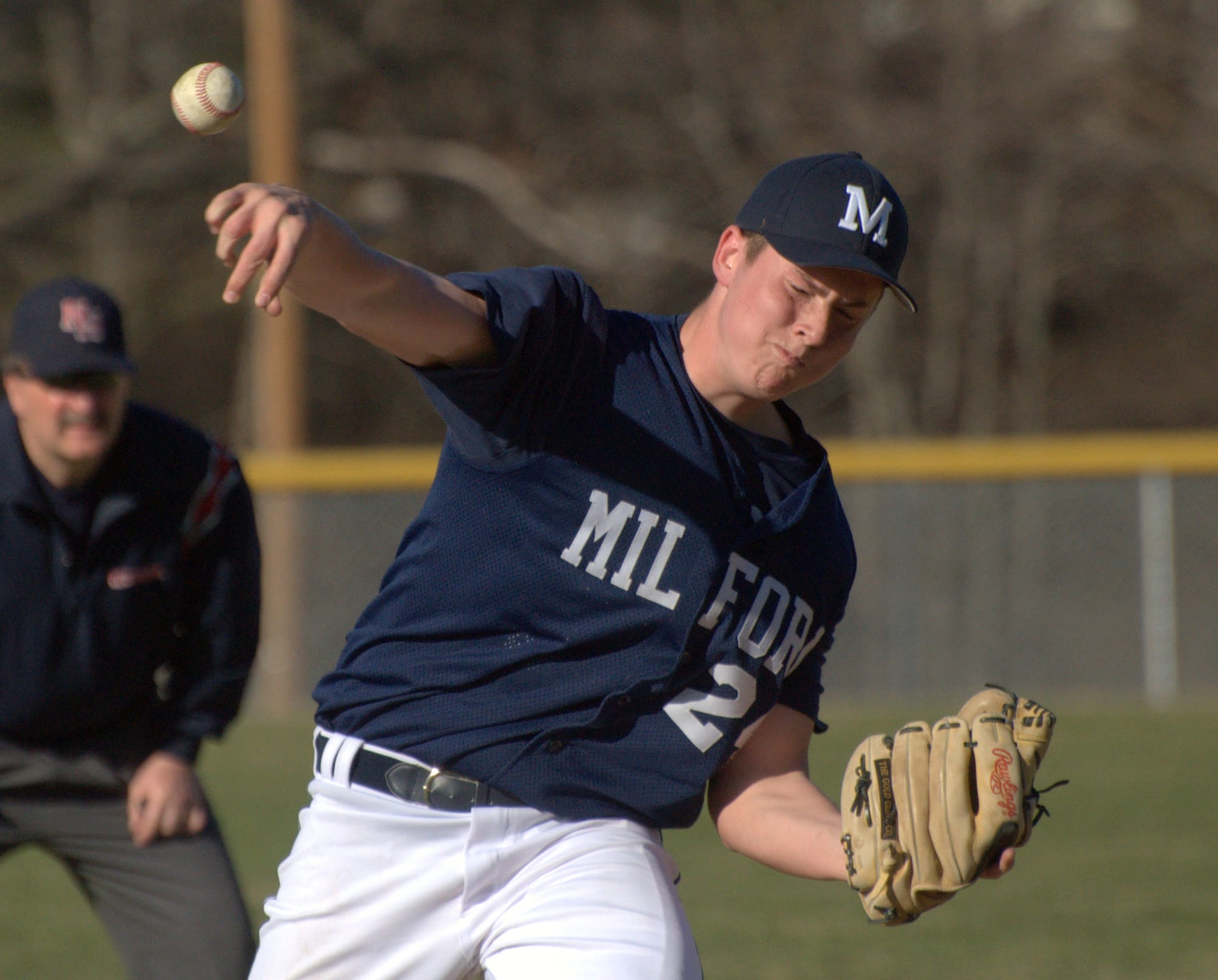 Milford's Logan Danforth delivers a pitch.