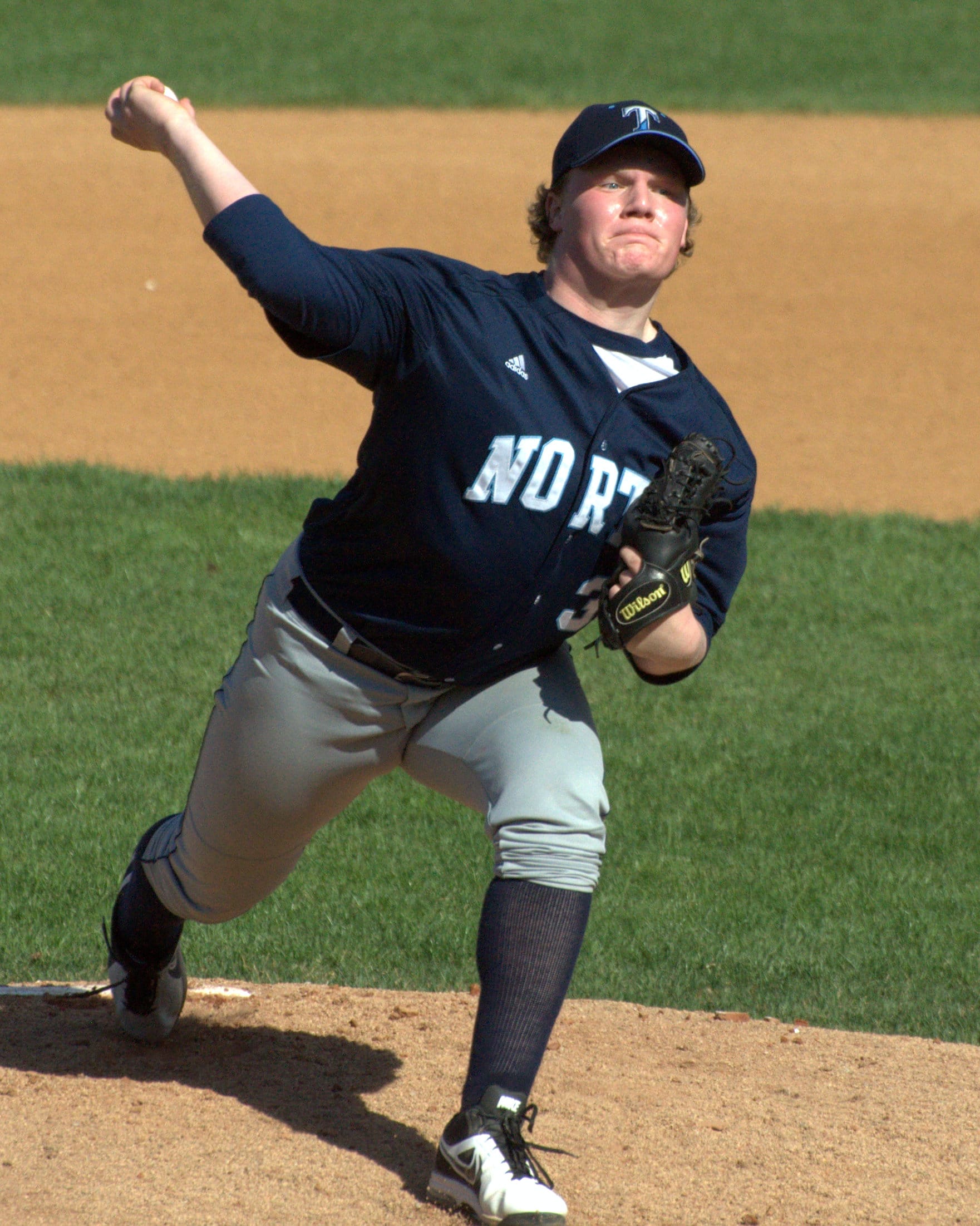 Nashua North's Zach Smith delivers a pitch.