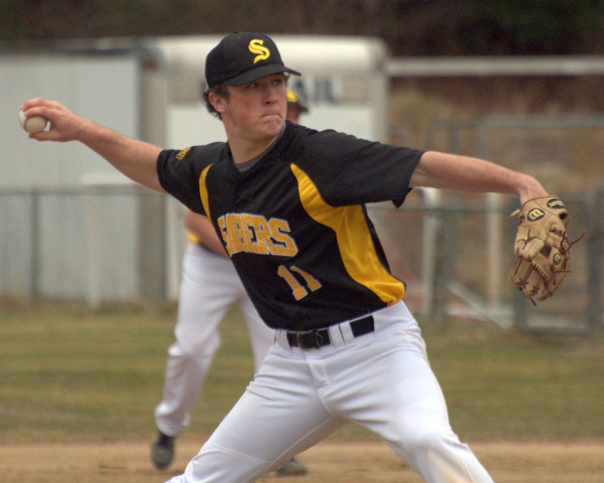 Souhegan's Seth Learned delivers a pitch.