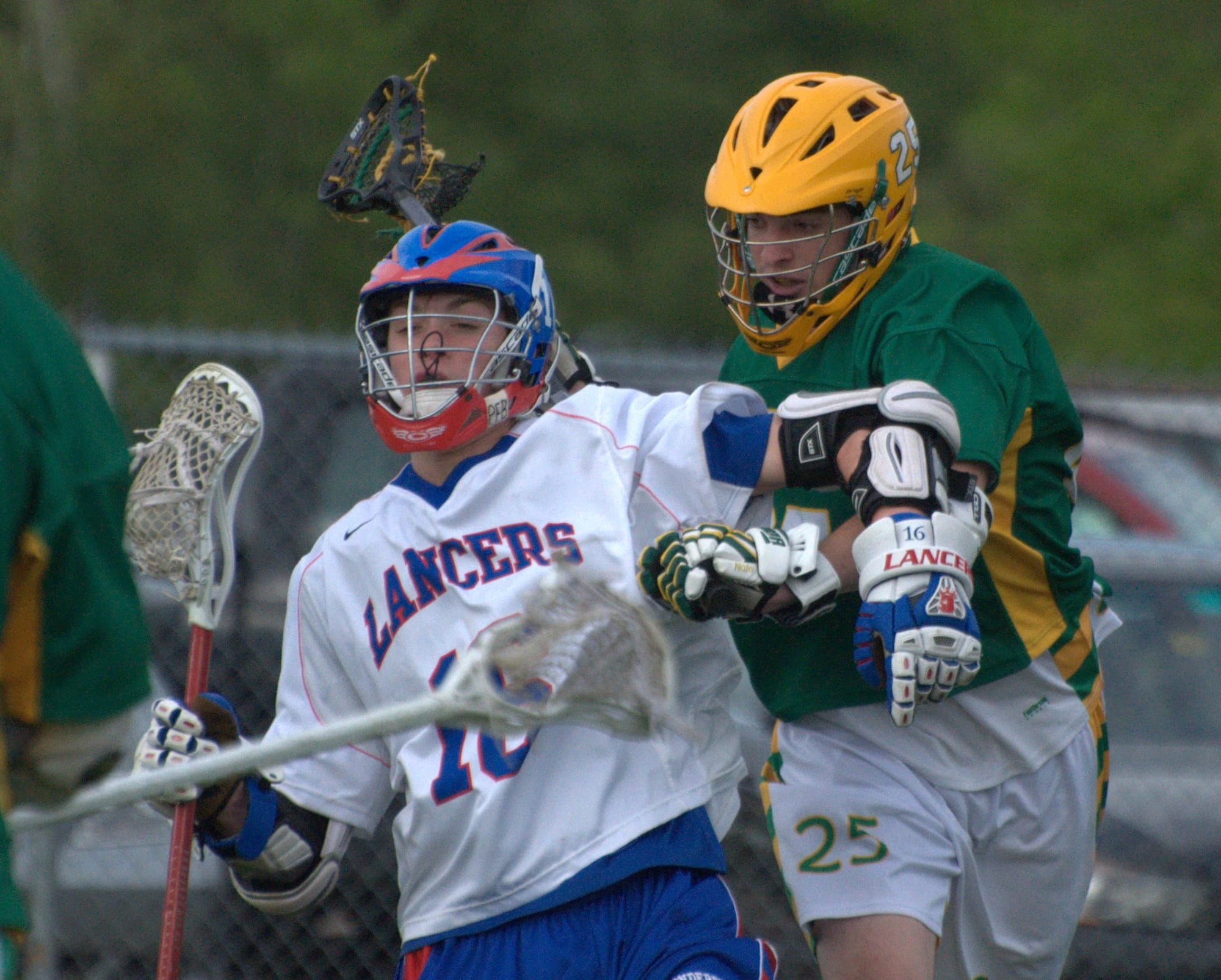 Bishop Guertin's Nate Eldred tries to slow down Londonderry's Nick Yennaco.