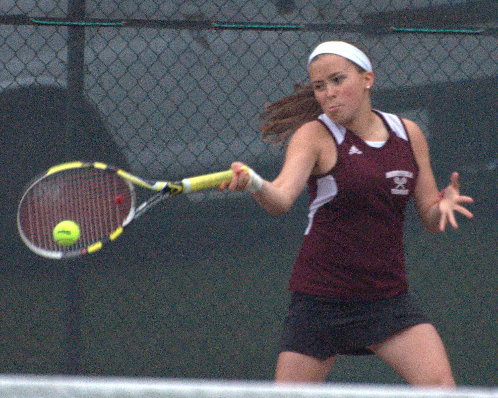 Derryfield's Colbi Vaillancourt returns a shot during Wednesday's match against Bedford.