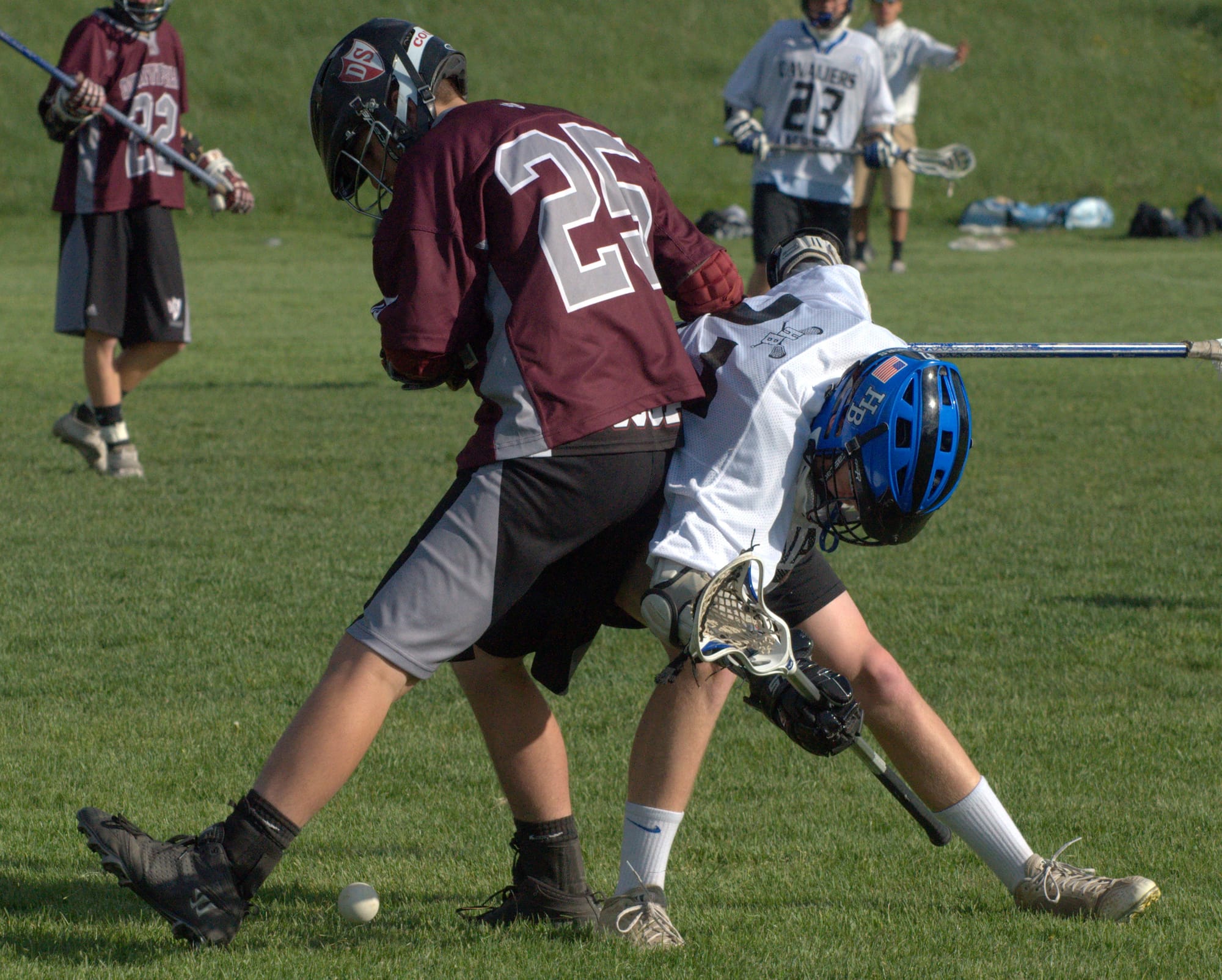 Derryfield's Joe Costa and Hollis Brookline's Patrick Dunn battle for a ball during a regular-season game. Both teams are high seeds in the Division III tournament.