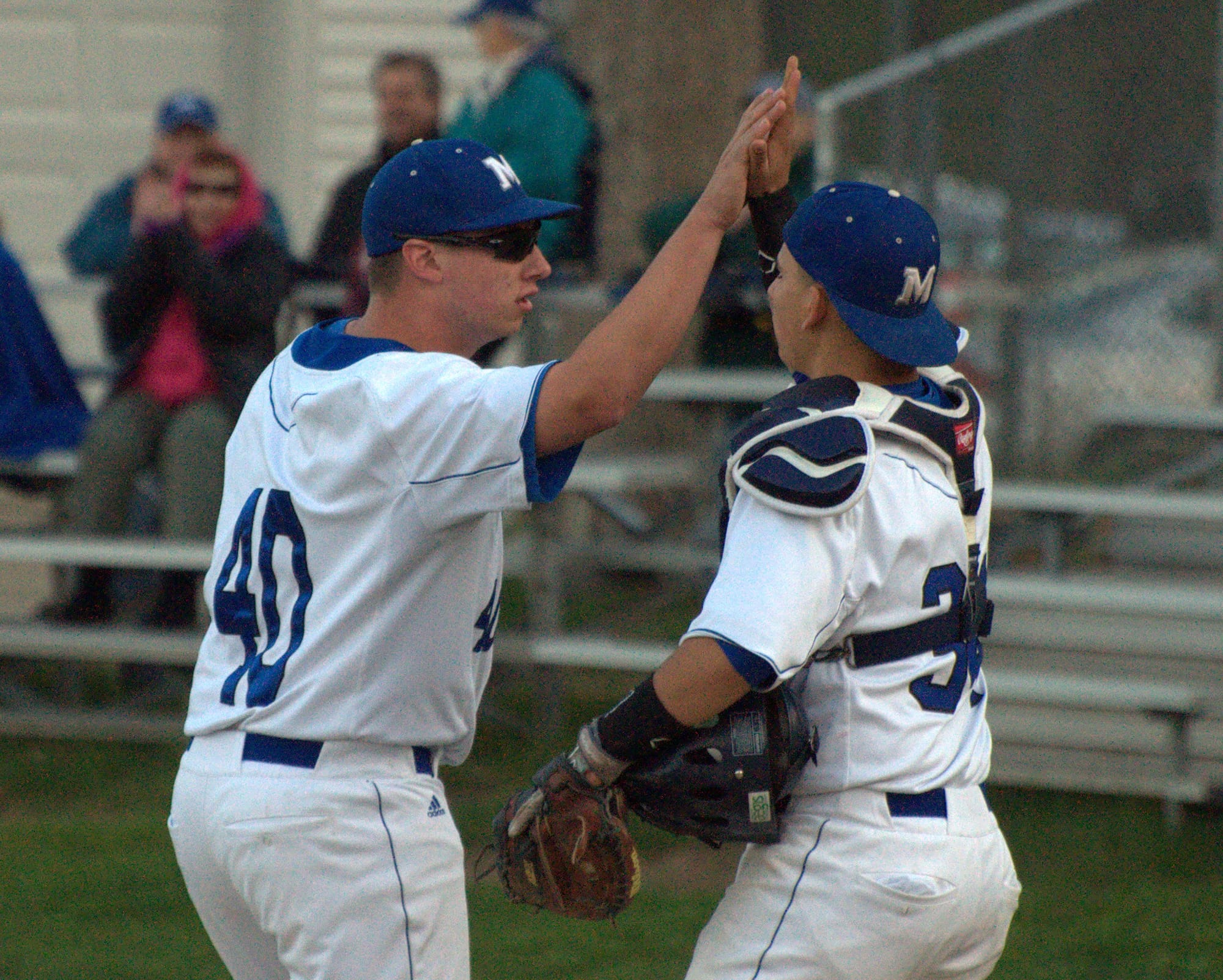 Merrimack's Nate Cushman, left, and Mickey Gasper celebrate after Monday's win over Manchester Memorial. For more photos, go to the Photo Album.